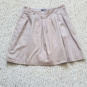 The Limited tan and white polka dot skirt A-line size 4 with pockets.